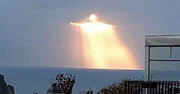 72.“Christ the Redeemer” Seen Radiating Light Through Clouds in Photo Taken by Man