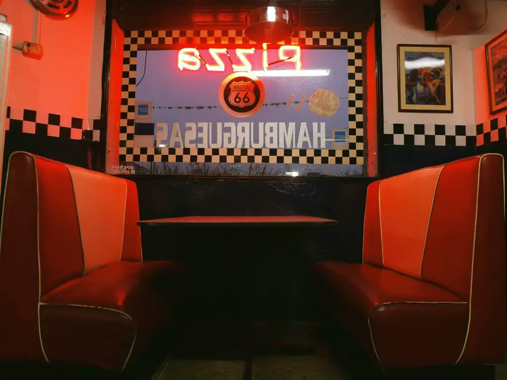 Waitress quietly fed a lonely boy every morning — until four black SUVs pulled up outside the diner and made the whole town go silent